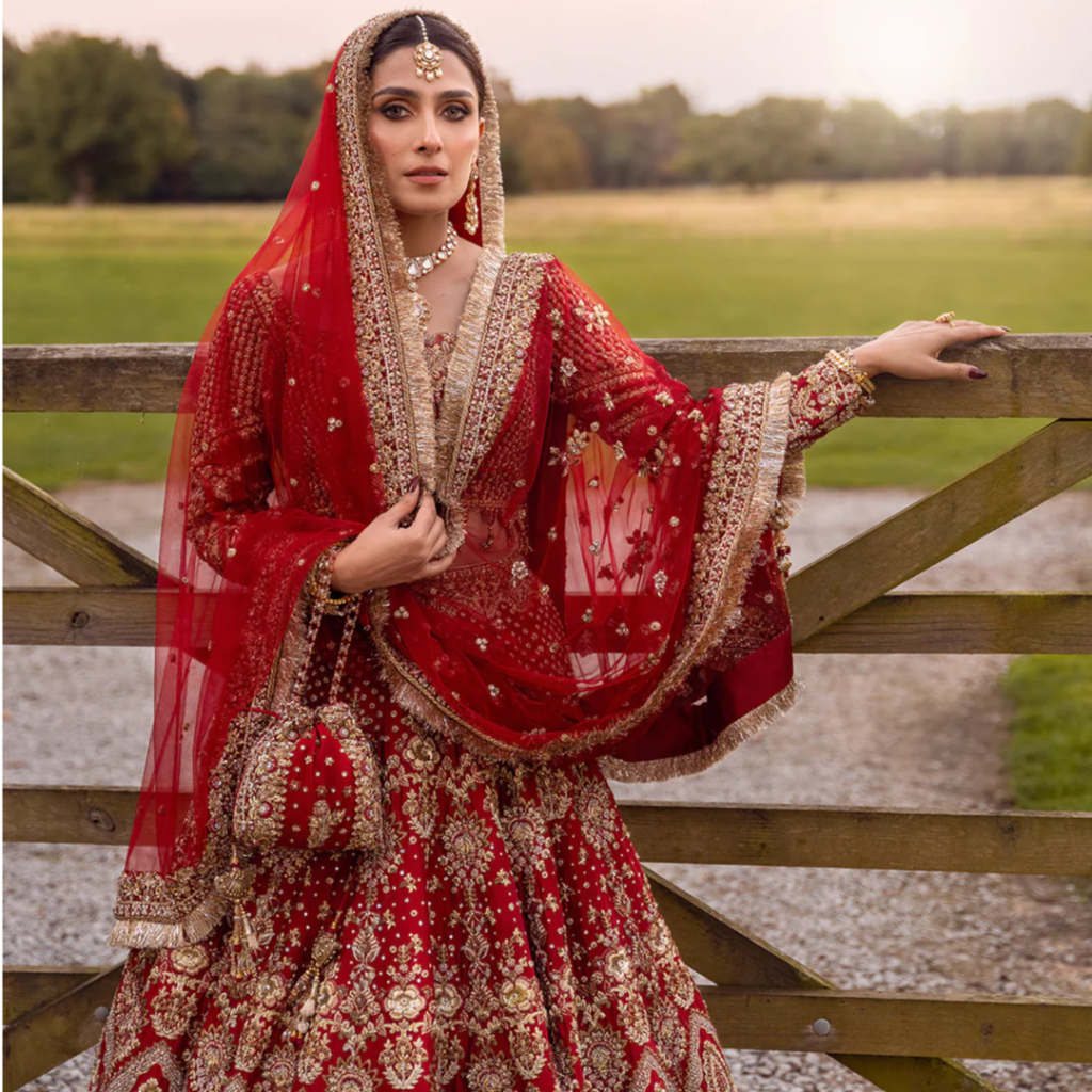 Raeni Red Bridal Lehenga Choli – Luxury Hand Embellished Pakistani Bridal Dress | Mastorat